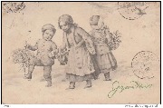 Joyeux Noël !(2 enfants dans la neige,portant sapin, houx et pommes de pin)