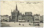 Tournai. La Grand-Place et l’Église St-Quentin ( construction du XIIe siècle ).