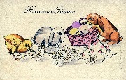 Un poussin et deux lapins avec panier d'oeufs