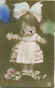 Poup&eacute;e au grand noeud avec ajoutis(yeux)