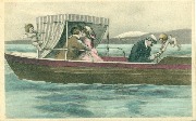 Couple s'embrassant sur un bateau avec angelots