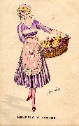 Fermi&egrave;re tenant des poussins dans un panier d'osier. Heureuses P&acirc;ques