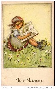 (fillette regardant un livre d'images assise dans un pr&eacute; fleuri)