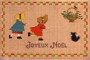 Joyeux No&euml;l (broderie d'un chat noir et de deux enfants courant, avec un panier de fruits )
