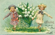 Amitié. Deux fillettes transportent un panier rempli de muguet Amitié. Deux fillettes transportent un panier rempli de muguet