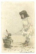 Petite fille jouant avec un lapin chargé d'oeufs de Pâques