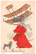 Le Merveilleux-Femme au chapeau en forme de biplan et petit caniche noir