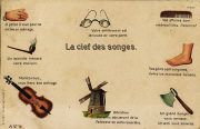 La cl&eacute; des songes. Lunette, pipe, violon, moulin, hache, pied, peigne
