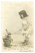 Petite fille jouant avec un lapin charg&eacute; d'oeufs de P&acirc;ques