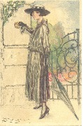 Femme au parapluie devant une grille en fer forgé